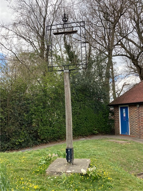 image of wooden post with metal frame