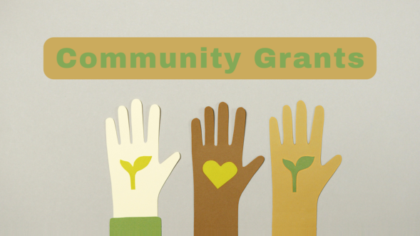 Graphic representation of three raised hands with symbols representing growth and love. With text saying community grants.
